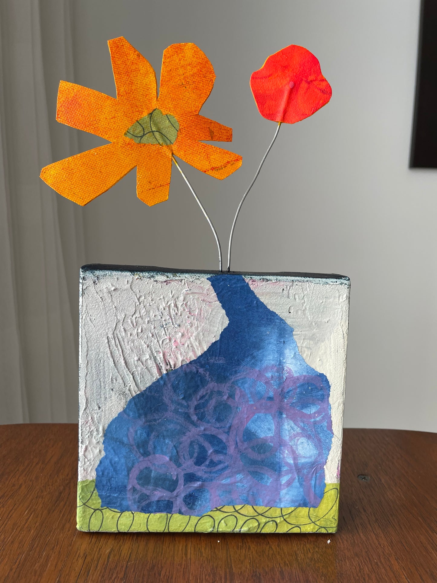 "Blooms Escaping Yellow Flower with Red Dot" $100 6"x 12" canvas and sculptural flowers