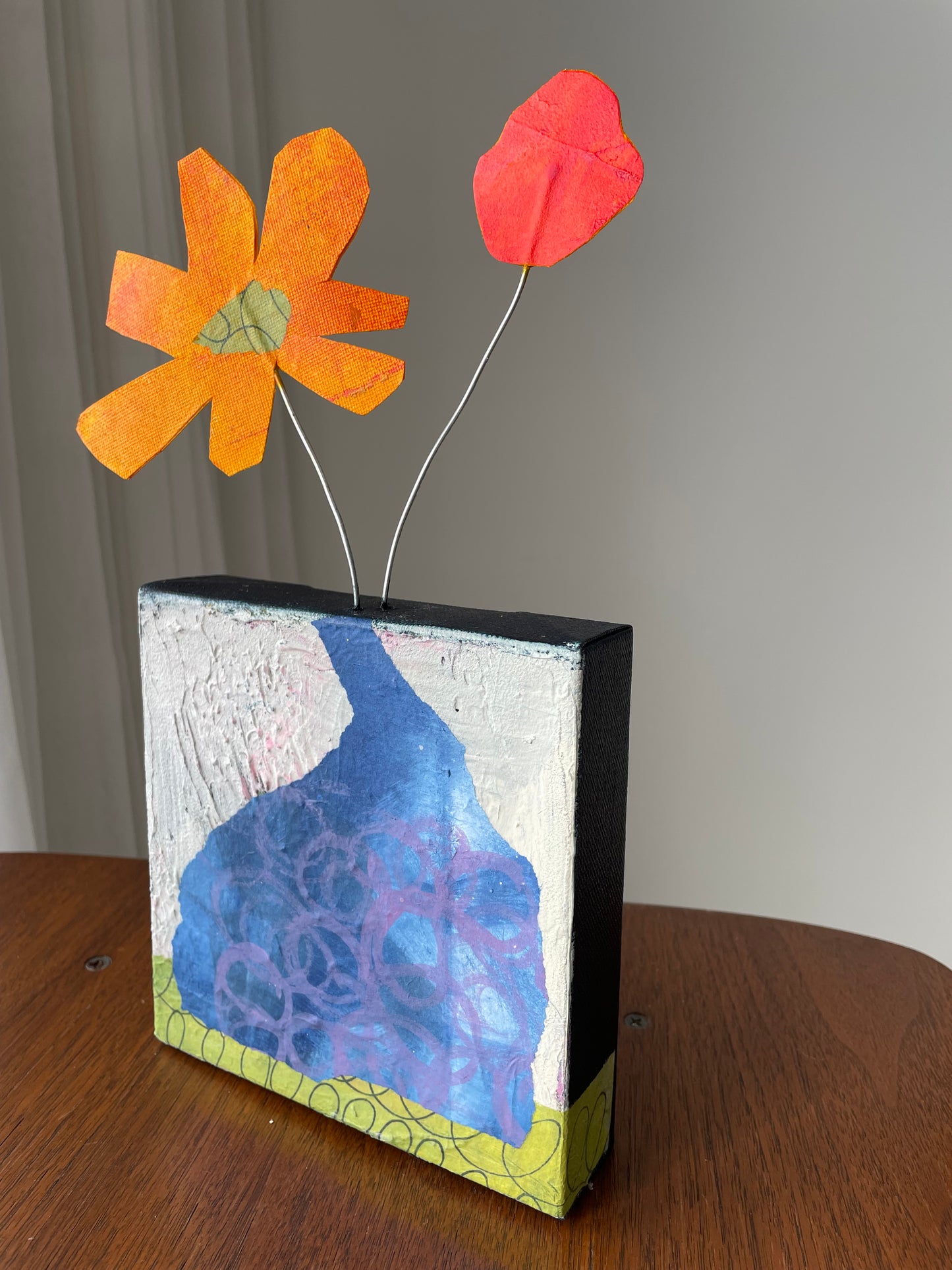 "Blooms Escaping Yellow Flower with Red Dot" $100 6"x 12" canvas and sculptural flowers