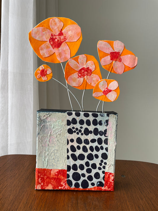 "Orange Blooms Escaping" $100 6"x 13.5" canvas and sculptural flowers