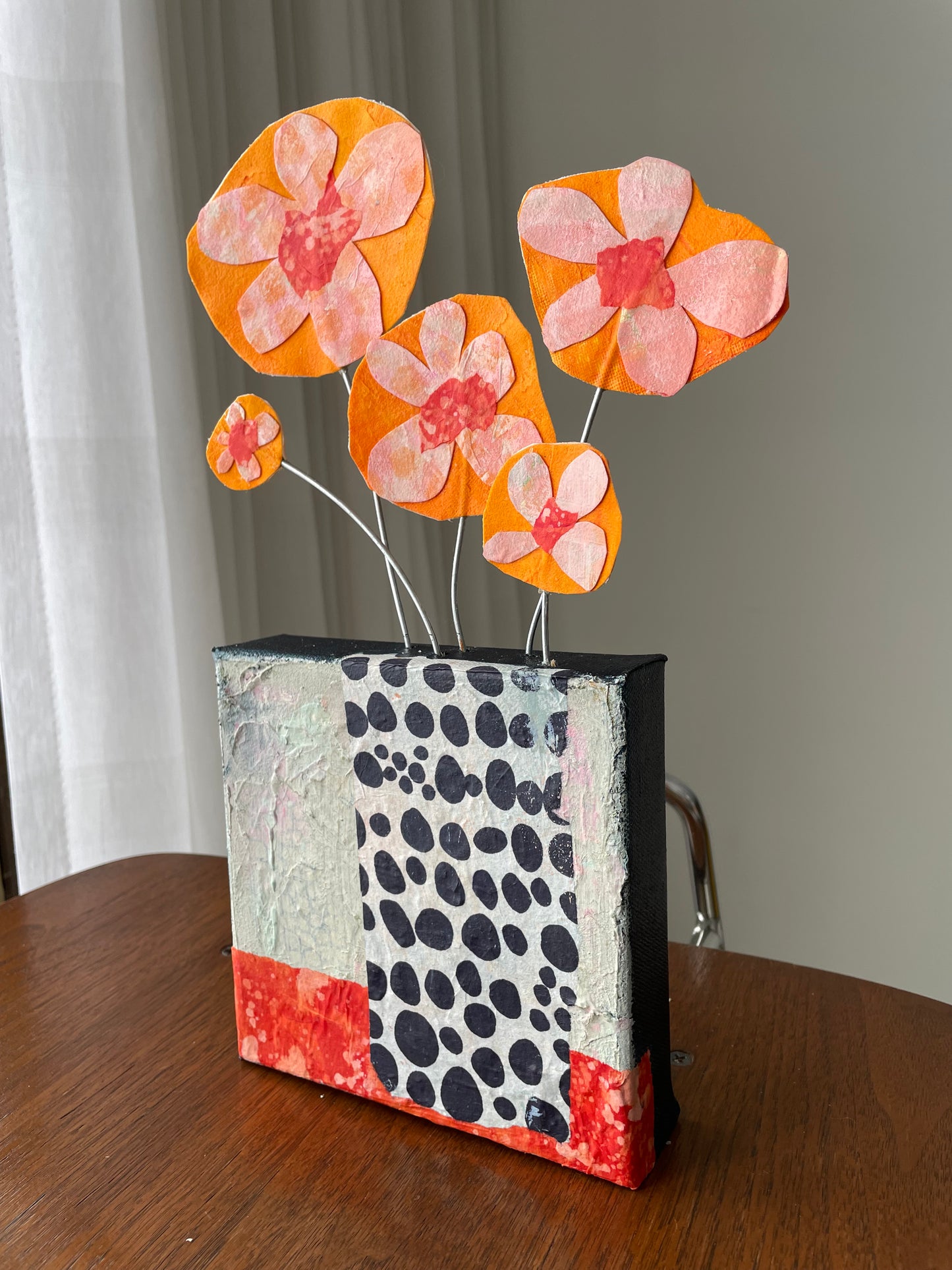 "Orange Blooms Escaping" $100 6"x 13.5" canvas and sculptural flowers